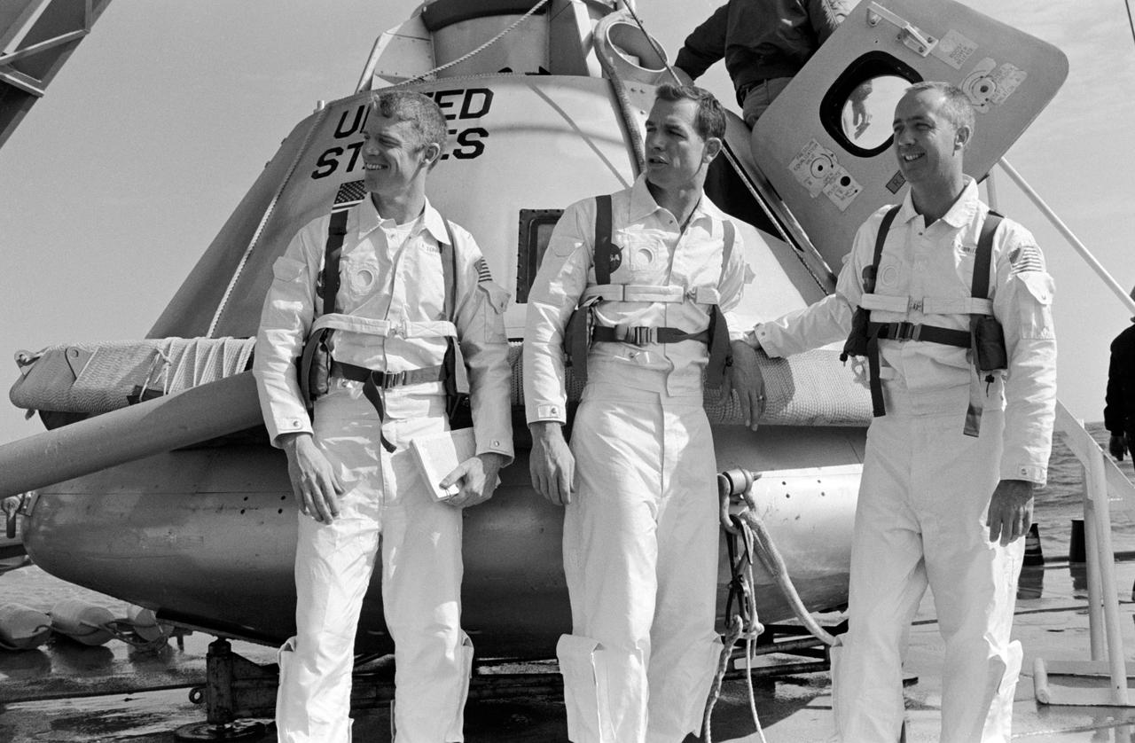NASA astronauts with splashdown capsule 1960s