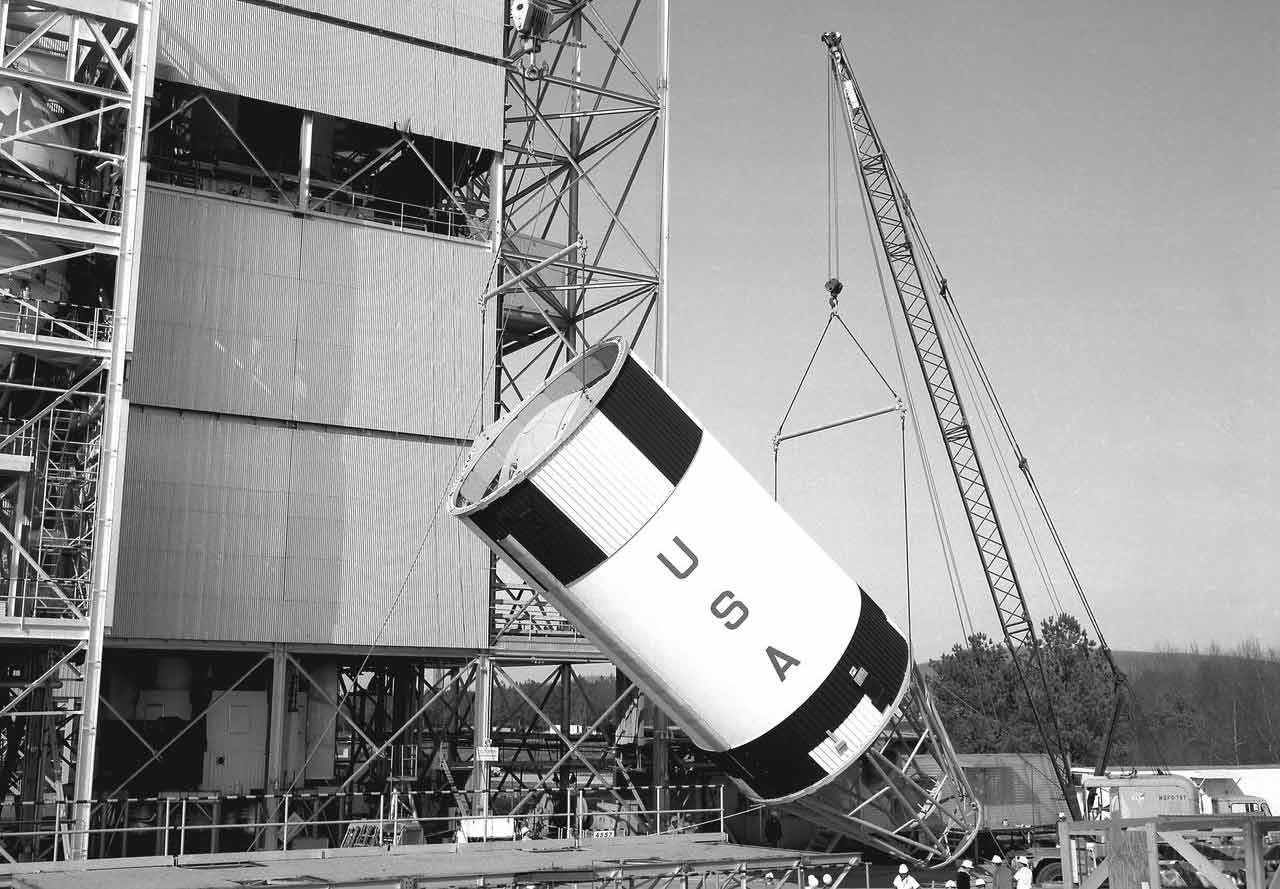 NASA rocket section being placed on launchpad 1960s
